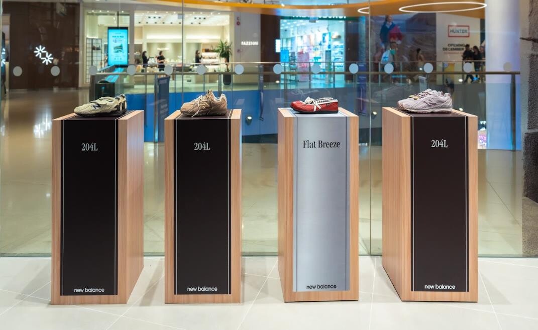 New Balance Flat Breeze and 204L low-profile sneakers on display plinths