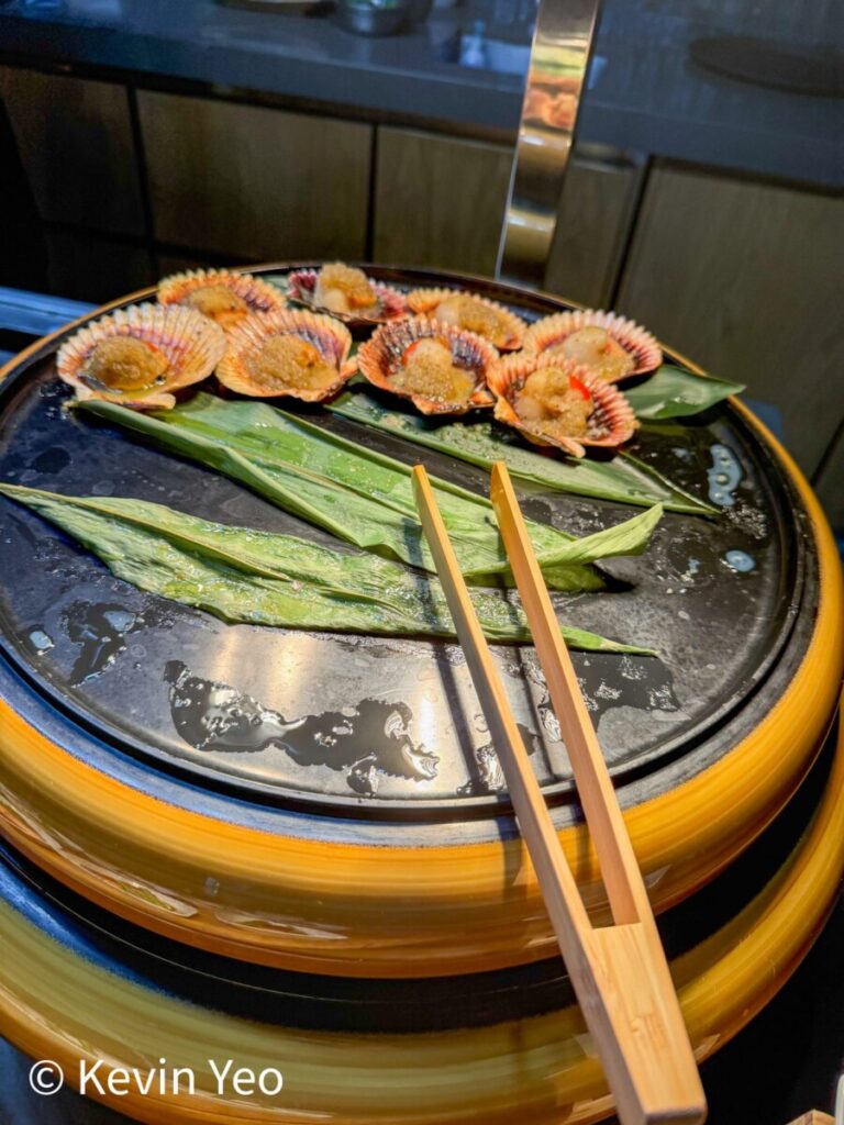 Grilled scallops in shell from the Nobu live station