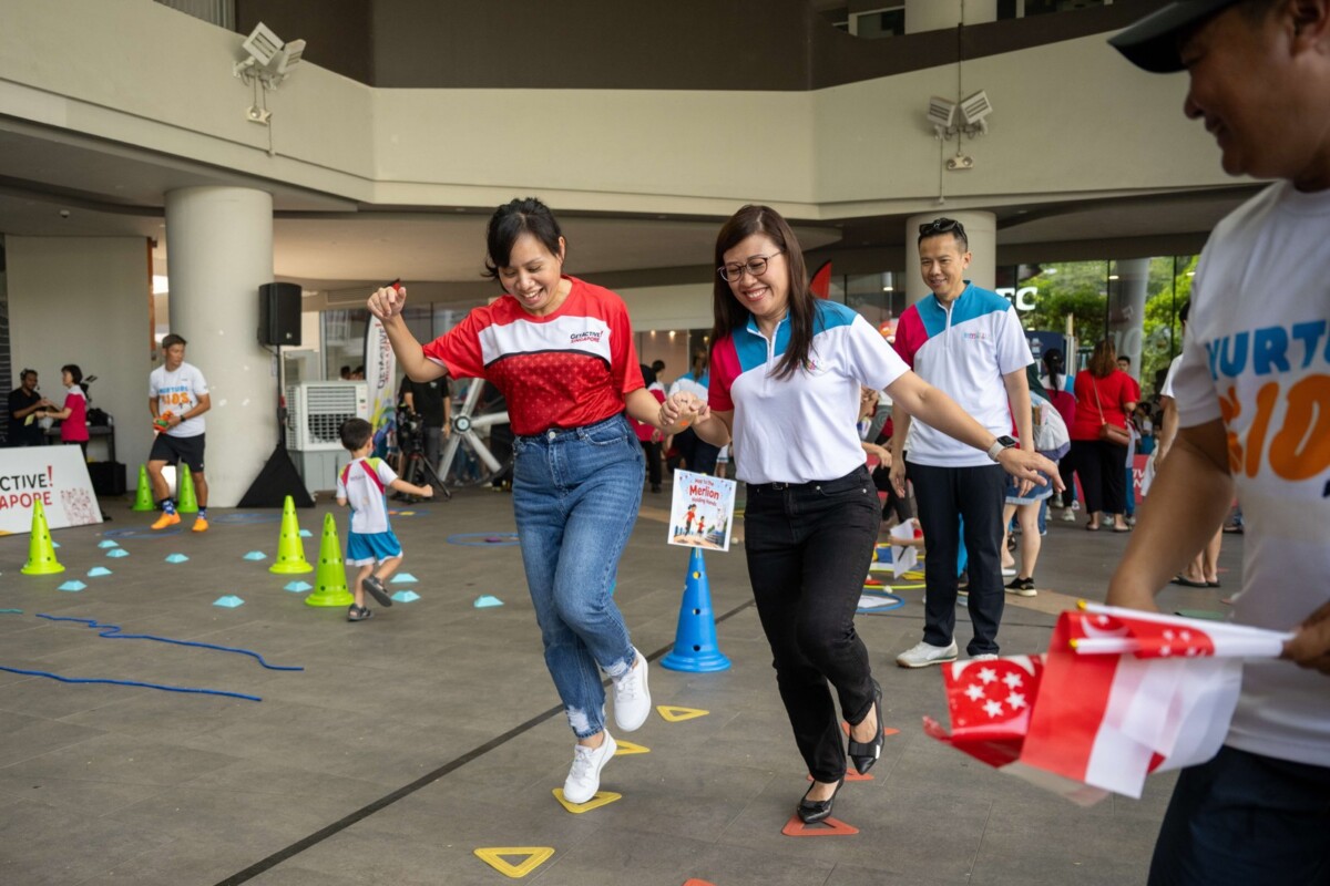 Guests and educators take part in National Day-themed games at M.Y World @ Canberra Eastlink. Image: Sport Singapore