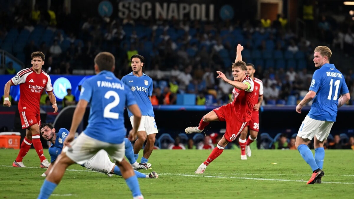 Martin Odegaard scores against Napoli in Champions League