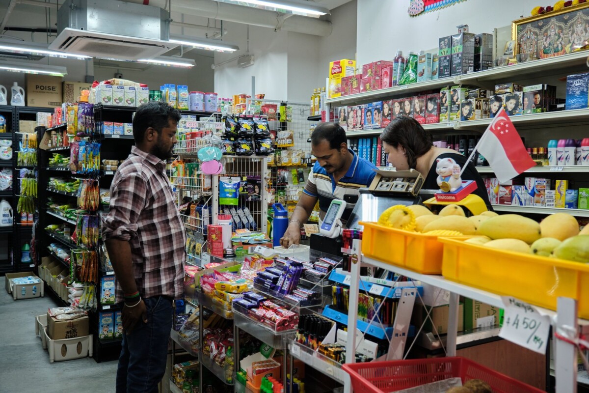 Artist Bridget Tay assisting at Hoseh Global Minimart in Punggol