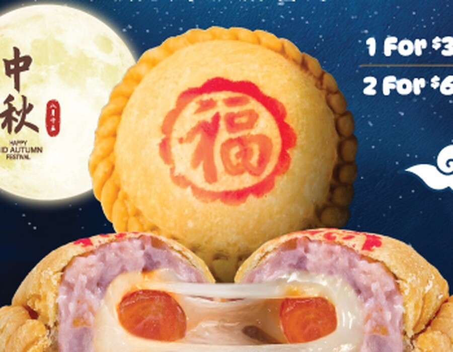 Salted Egg Taro Mochi'O puff split to show taro mochi and yolk