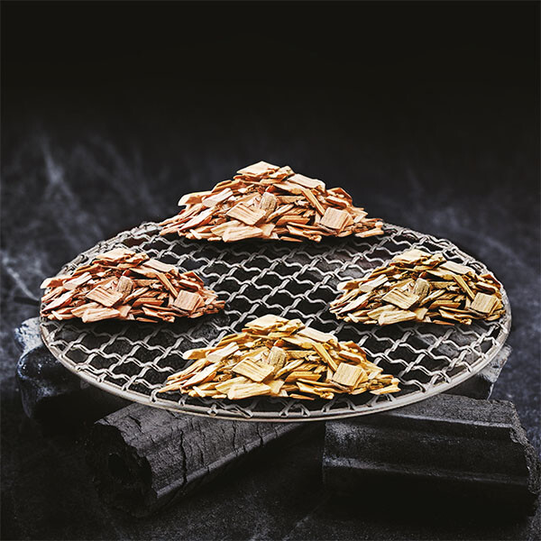 OMMA wood chips on charcoal grill