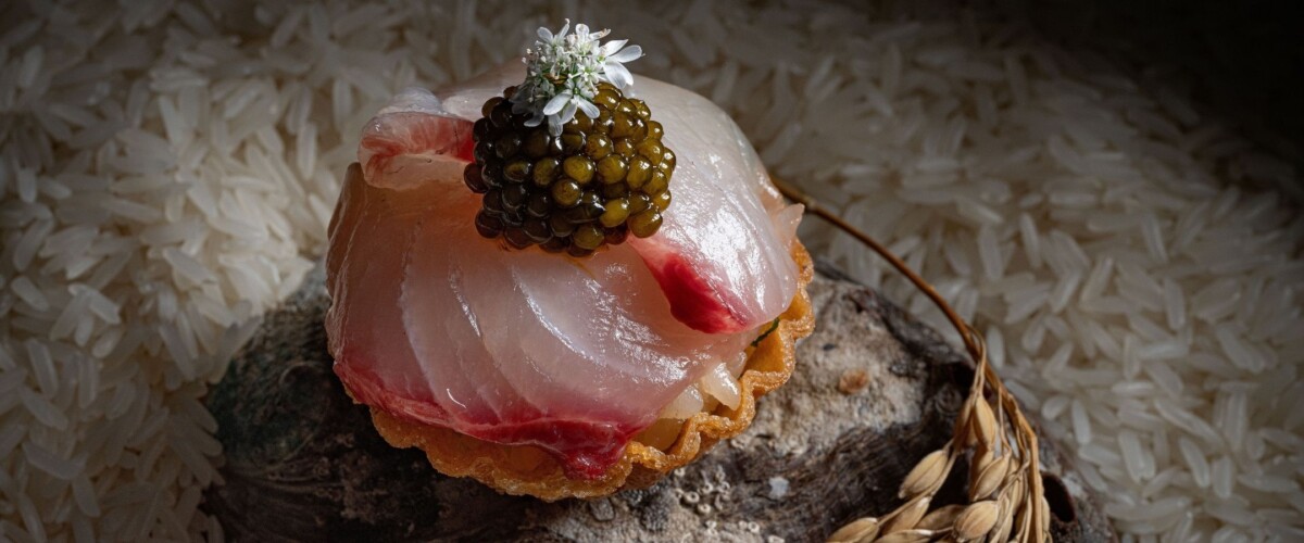 Chicken rice tart topped with cured kampachi and caviar at Peach Blossoms