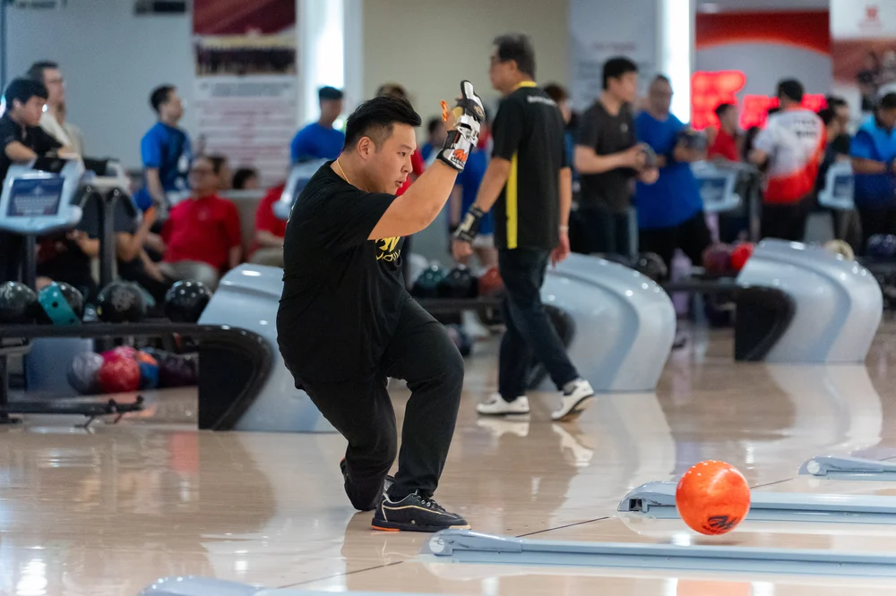 Bowler releasing a ball during the Pesta Sukan Community Championship