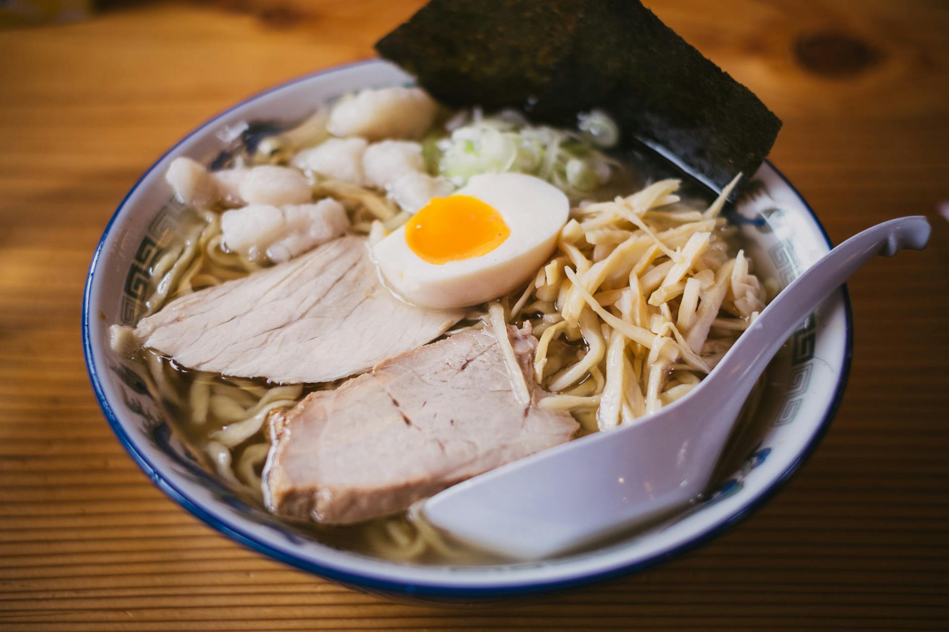 Steaming bowl of Japanese ramen in Singapore restaurant