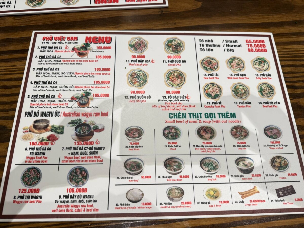 Pho Vietnam Saigon photo-heavy menu with every dish priced in Vietnamese dong
