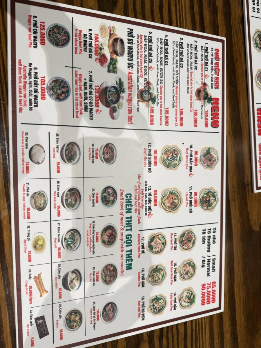 Pho Vietnam Saigon photo-heavy menu with every dish priced in Vietnamese dong