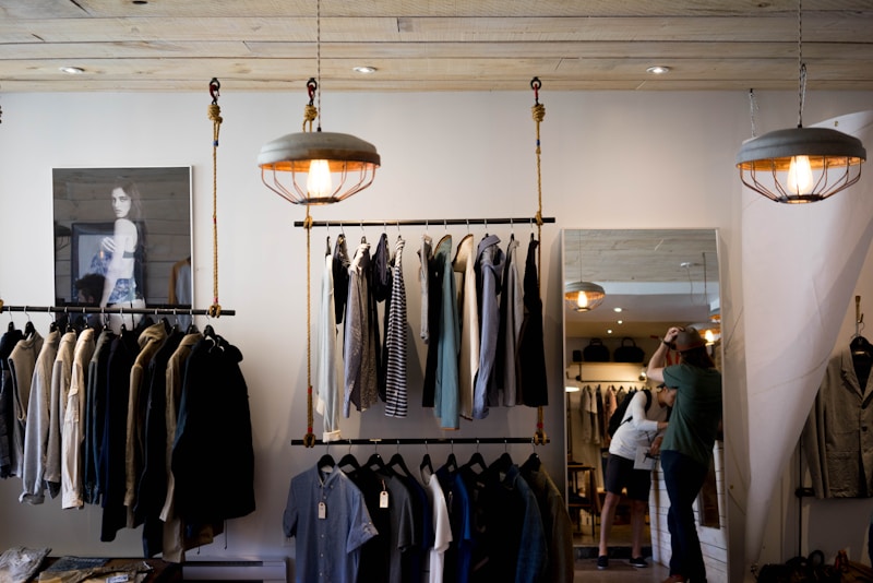 Department store clearance sale with shoppers browsing