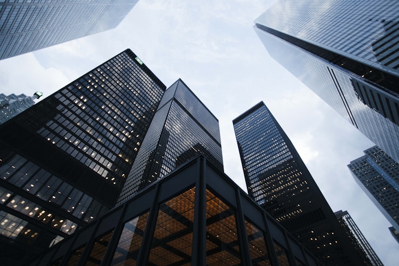 Singapore commercial buildings skyline representing S-REIT property portfolios