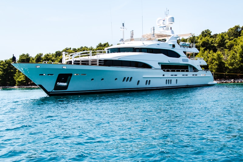 Luxury yachts moored at a marina similar to ONE°15 Sentosa Cove during Singapore Yachting Festival