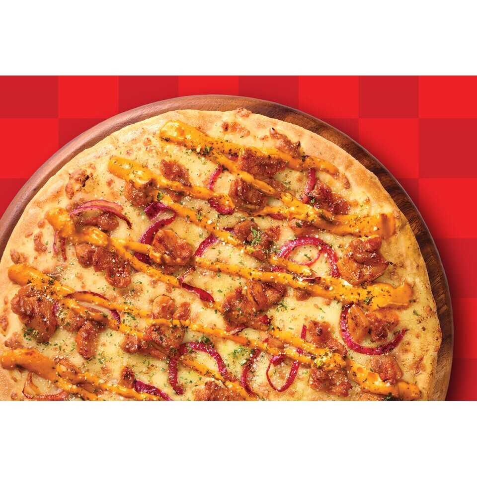 Otah Laksa Pizza, available in the $10 large pizza takeaway deal with a $1 top-up