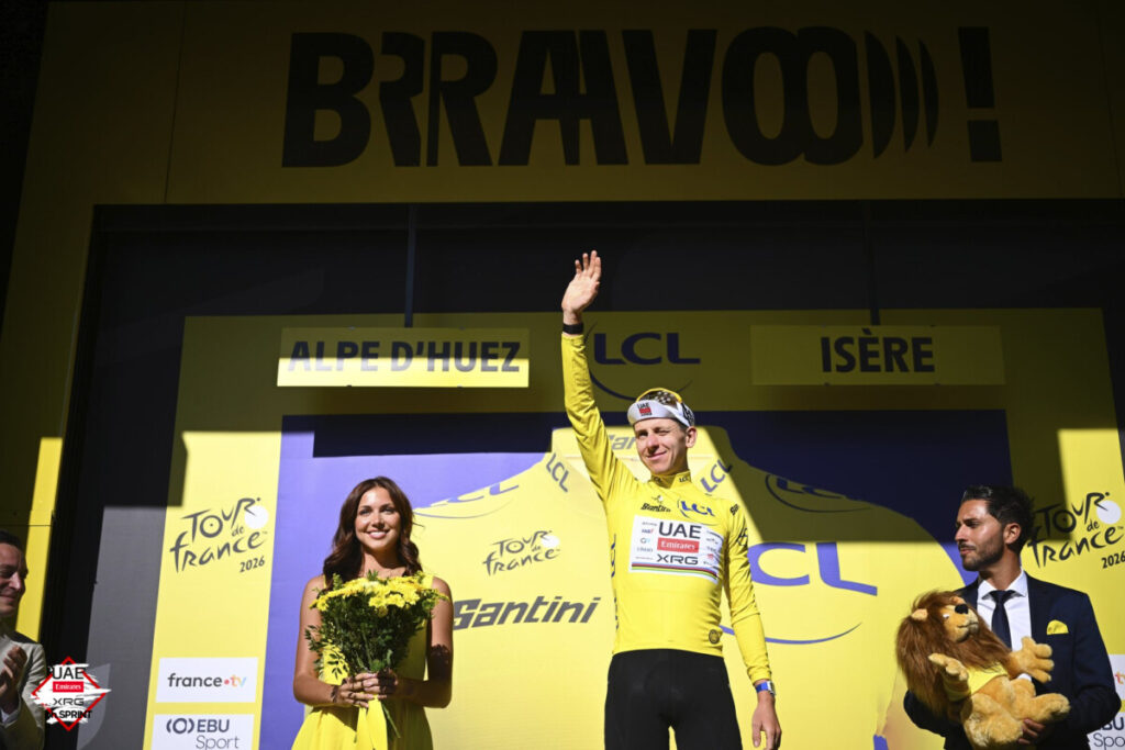 Tadej Pogačar in Yellow Jersey on the Alpe d’Huez podium Tour de France 2026