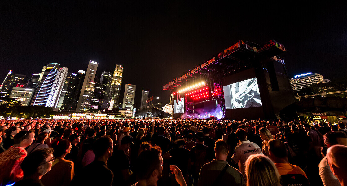 Crowd in the Concert Fan Zone in front of the Padang Stage at the Singapore Grand Prix at night