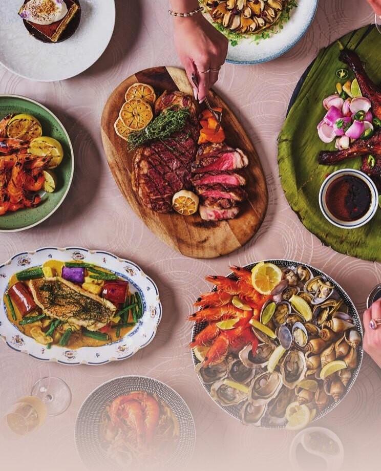 Grilled meats from the land including Angus beef striploin and charred lamb ribs at Racines Turf & Tide brunch