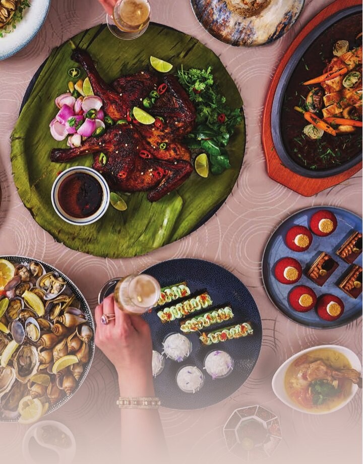 Seafood spread with grilled red snapper, otak-otak and fresh oysters at Racines Turf & Tide brunch