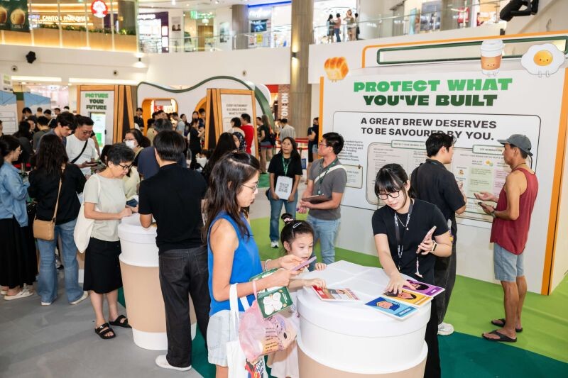 Visitors at the Protect What You Have Built zone with CPF staff