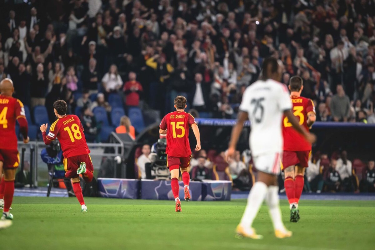 AS Roma and Real Madrid players contest the ball at the Stadio Olimpico in the Champions League