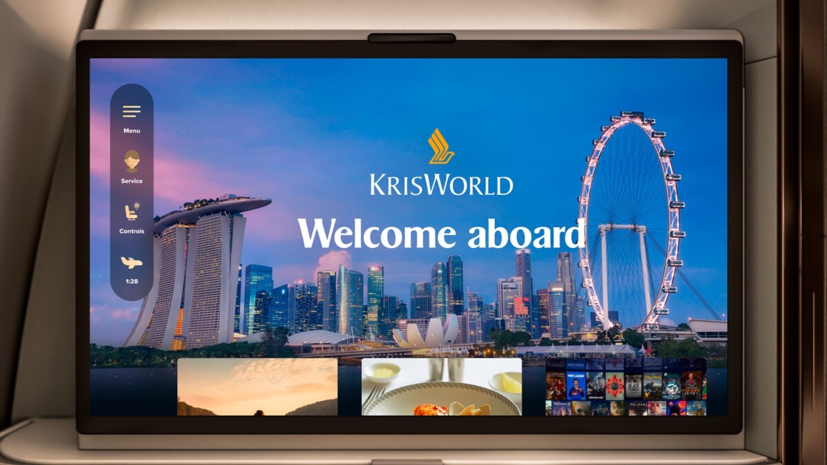 Next-generation KrisWorld home screen showing a Welcome aboard message over the Singapore skyline