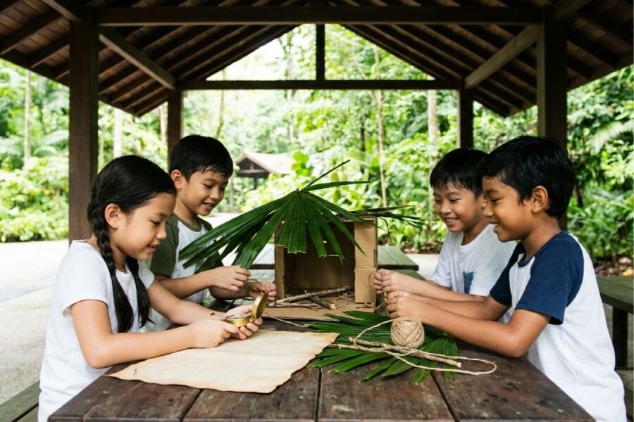 Children building eco habitat at Singapore Zoo Wild Architect programme