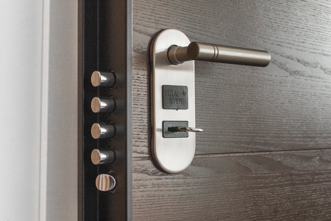 Digital smart door lock with electronic keypad on a wooden door