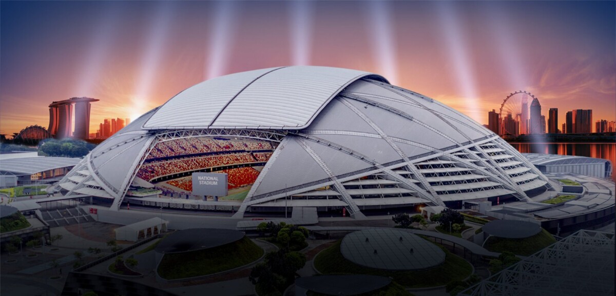 The National Stadium at The Kallang lit up at dusk, the finish venue for every race distance