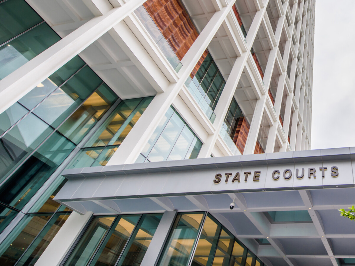 State Courts signage on the entrance canopy below the State Courts Towers at 1 Havelock Square