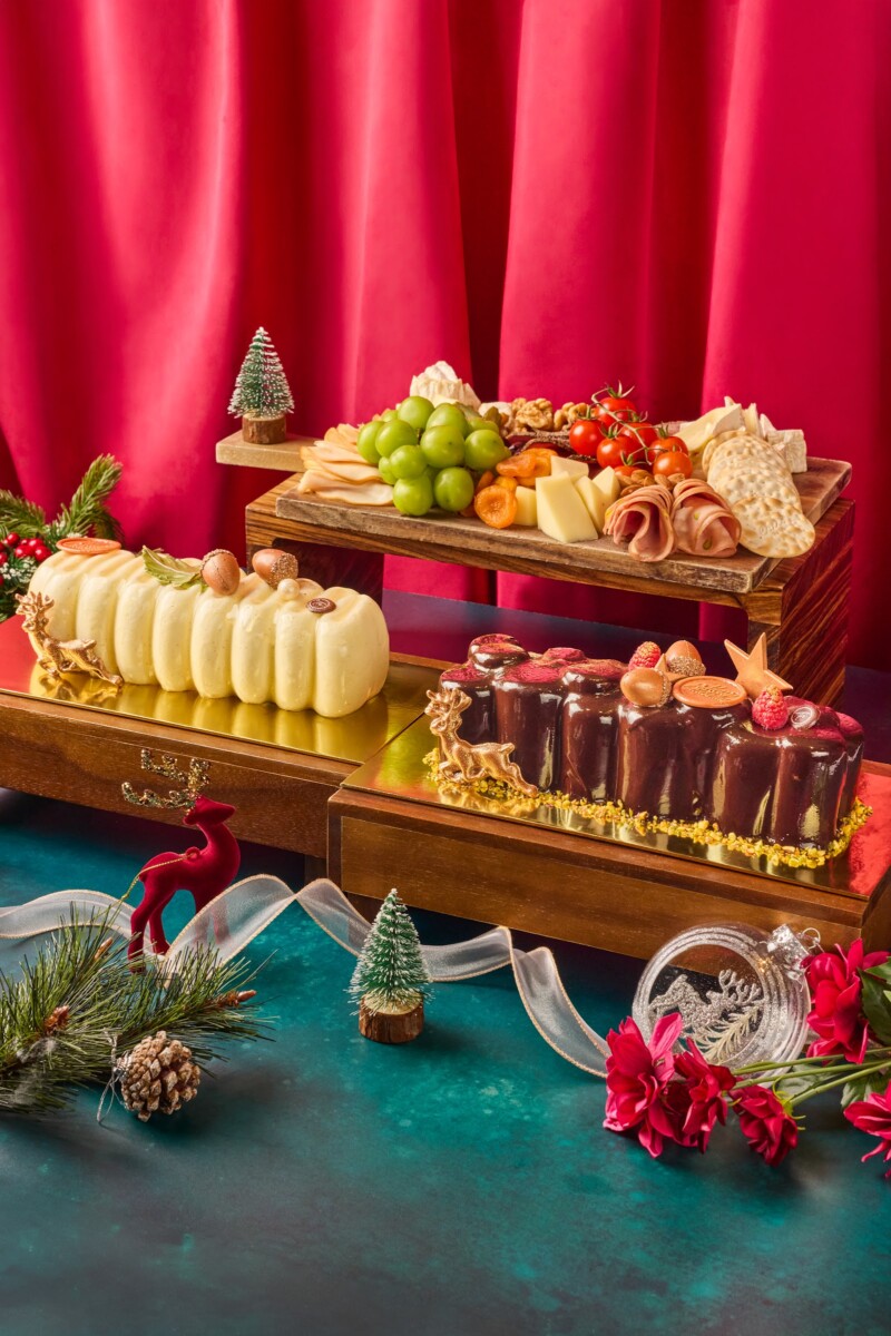 The Sweet Bar with log cakes and Charcuterie Cheese Yuletide Board at Tablescape