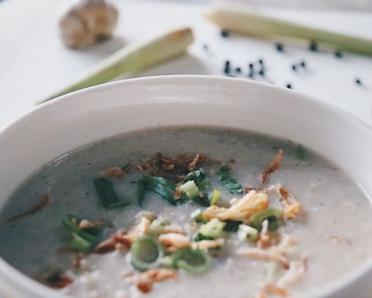 Bowl of Orang Laut SG bubur lambuk tenggiri, a Spanish mackerel porridge with prawns