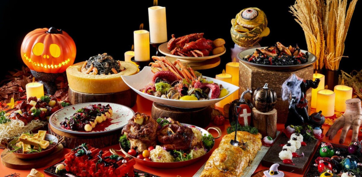 The Line Halloween dinner buffet spread with lobster, Parmesan wheel pasta and pumpkin lantern at Shangri-La Singapore