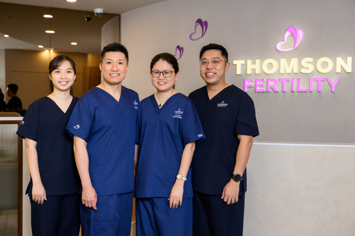 Thomson Fertility United Square team of medical specialists in scrubs at the clinic reception