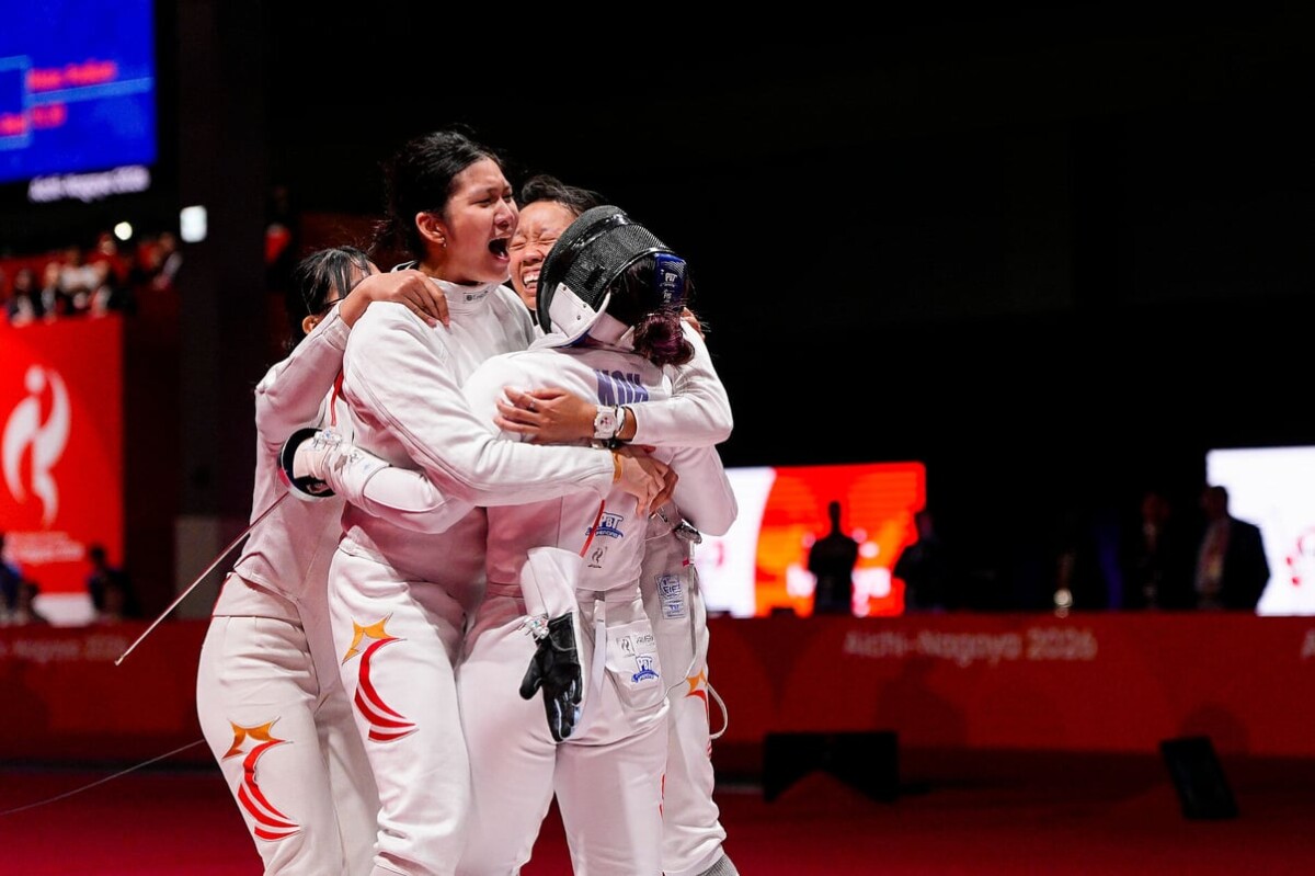 Singapore women's epee team celebrating Asian Games 2026 bronze