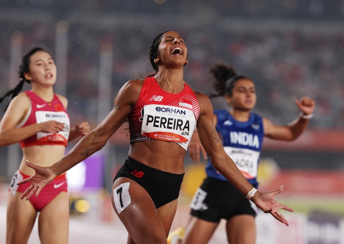 Shanti Pereira after winning Asian Games 2026 women's 200m gold
