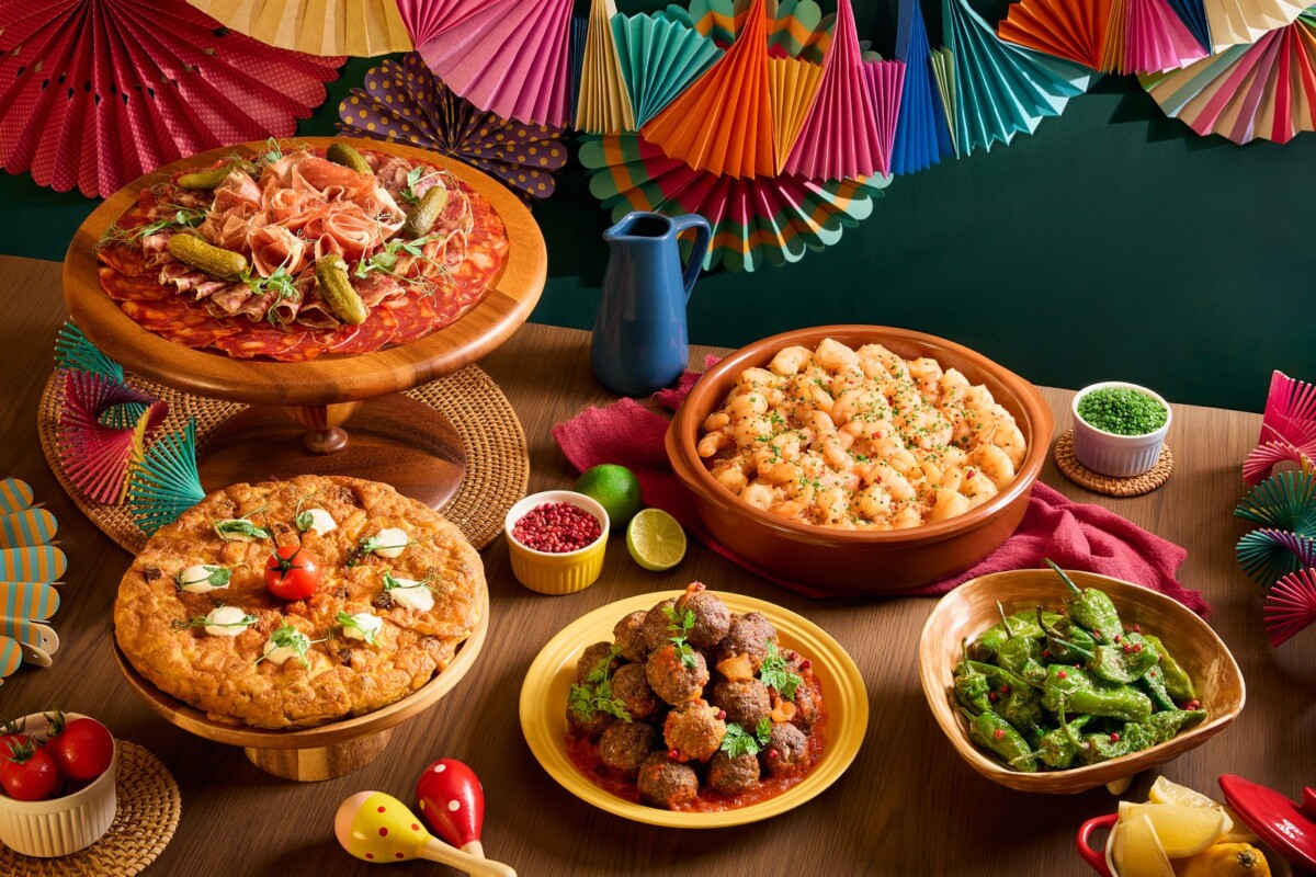 Spanish tapas spread of meatballs, garlic prawns, padron peppers and tortilla at Verandah