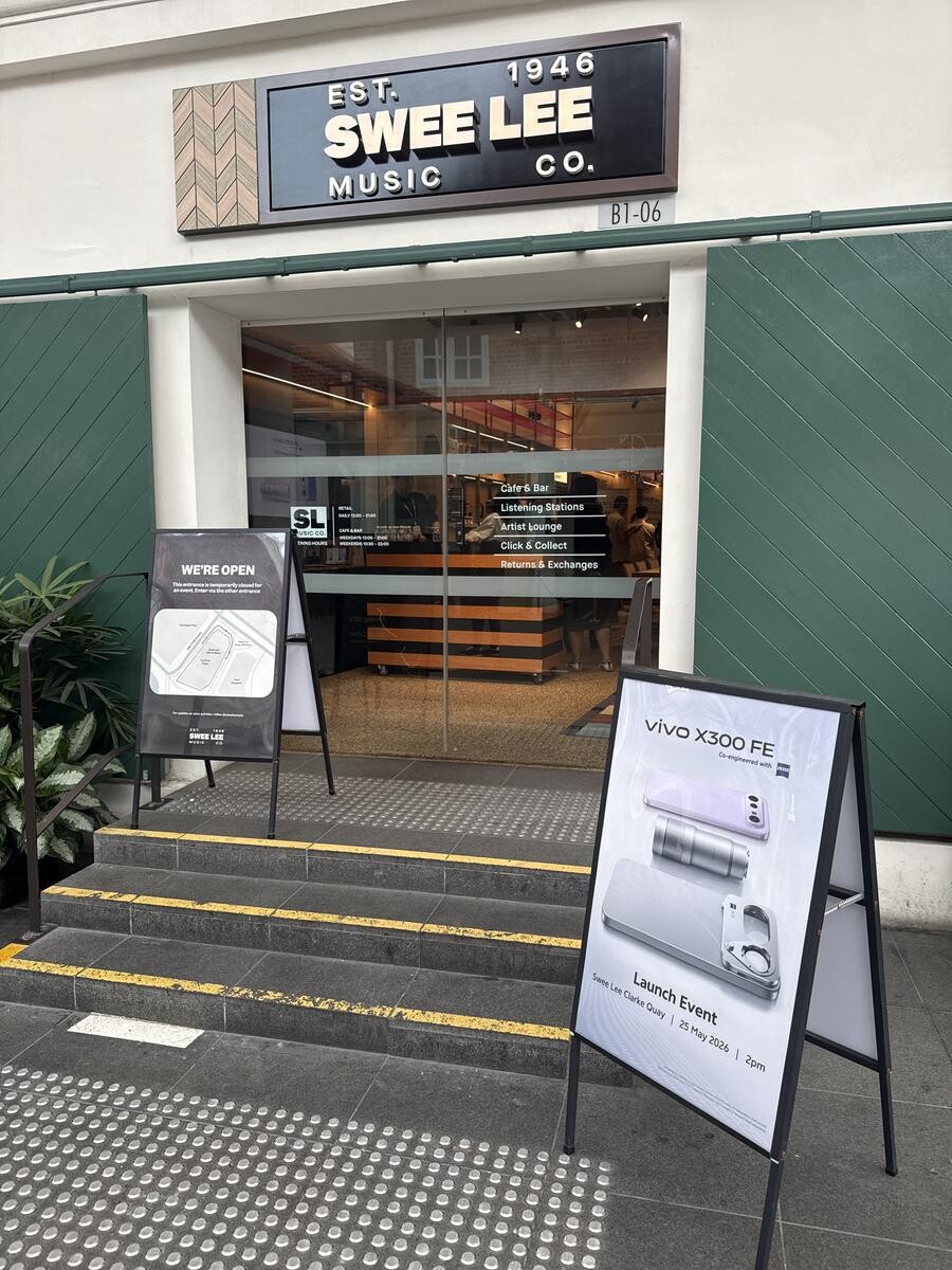 vivo X300 FE launch event board outside Swee Lee Music Co Clarke Quay Singapore