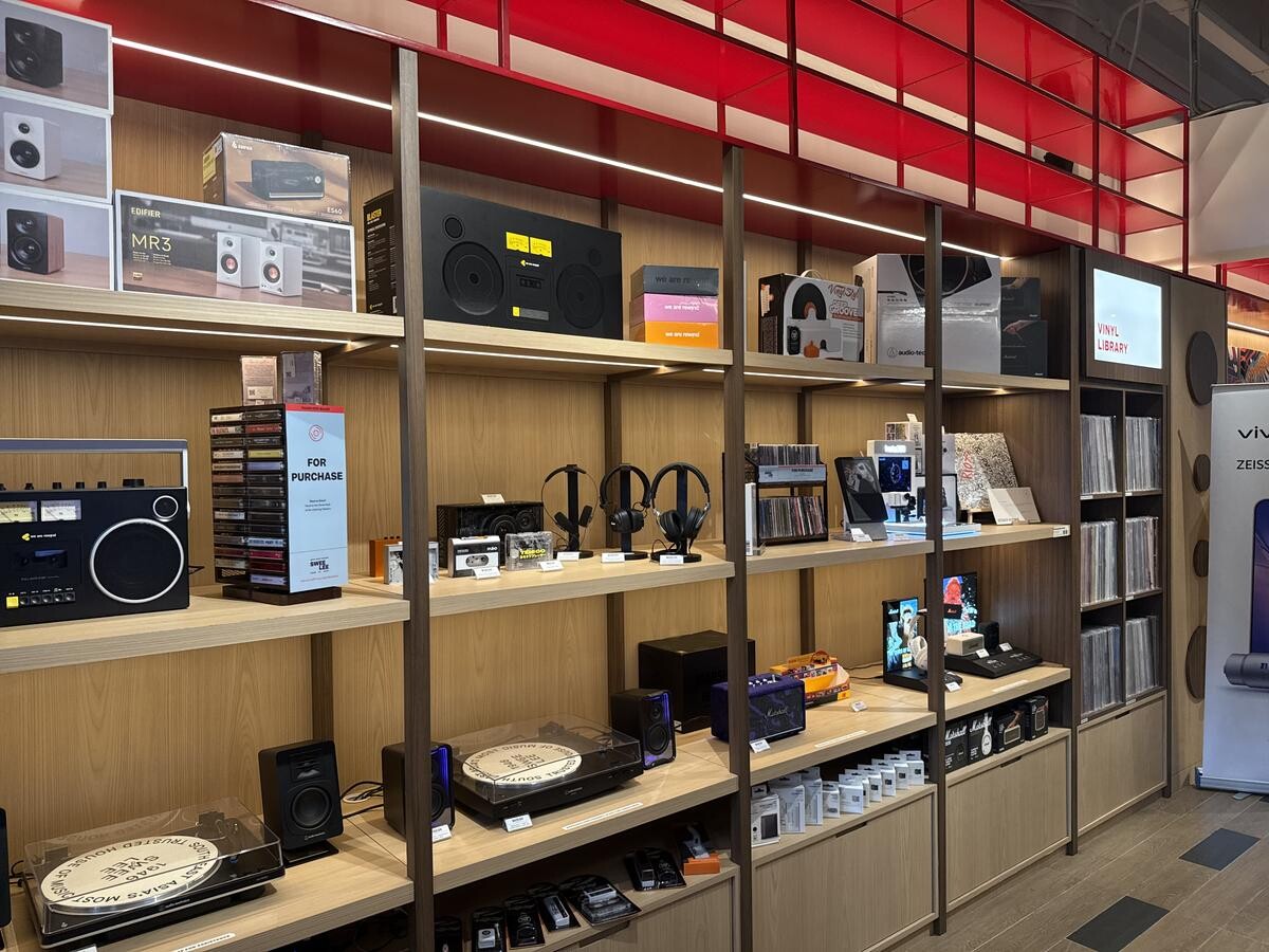 Swee Lee Music Co audio equipment shelves with vinyl records and headphones on display