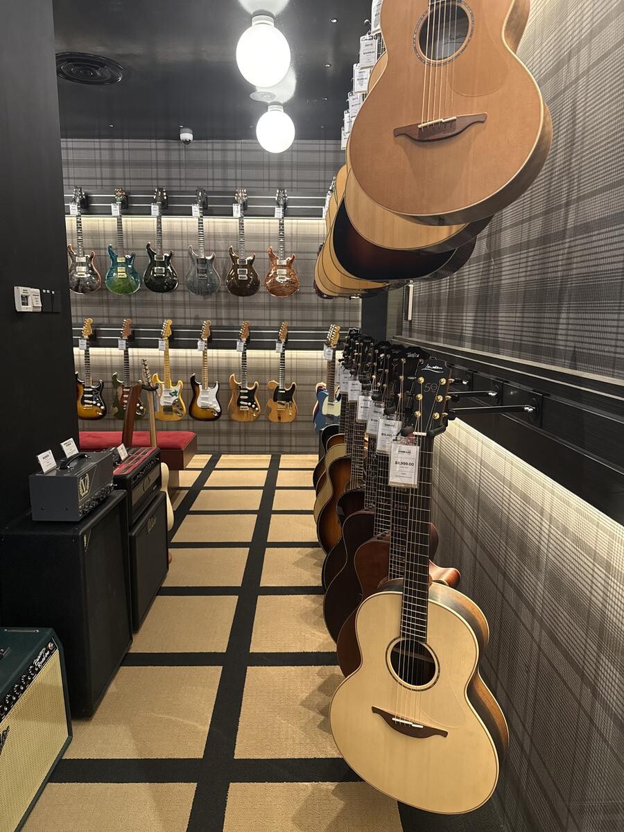 Guitar room at Swee Lee Music Co Clarke Quay featuring acoustic and electric guitars