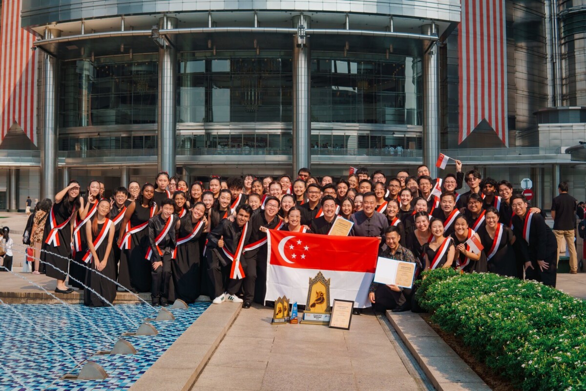 Voices of Singapore choristers at the Petronas Towers, Kuala Lumpur