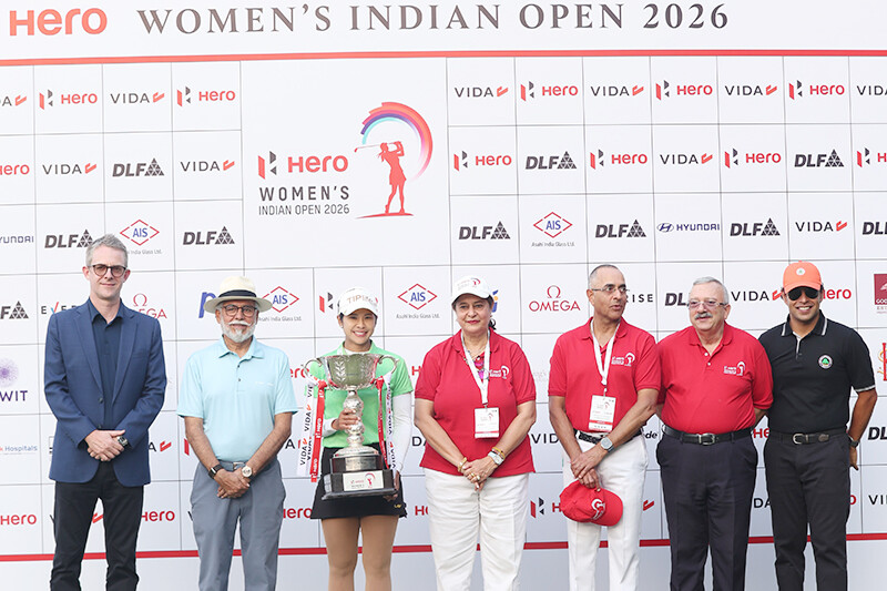 Officials and a player with the trophy at the Hero Women's Indian Open 2026 press call