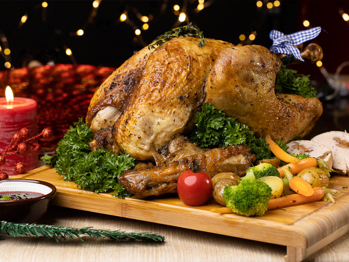 Holiday Inn Singapore Atrium traditional roasted turkey with stuffing and vegetables for Christmas takeaway